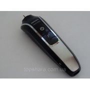 Мотор у корпусі тримера Philips QG3371